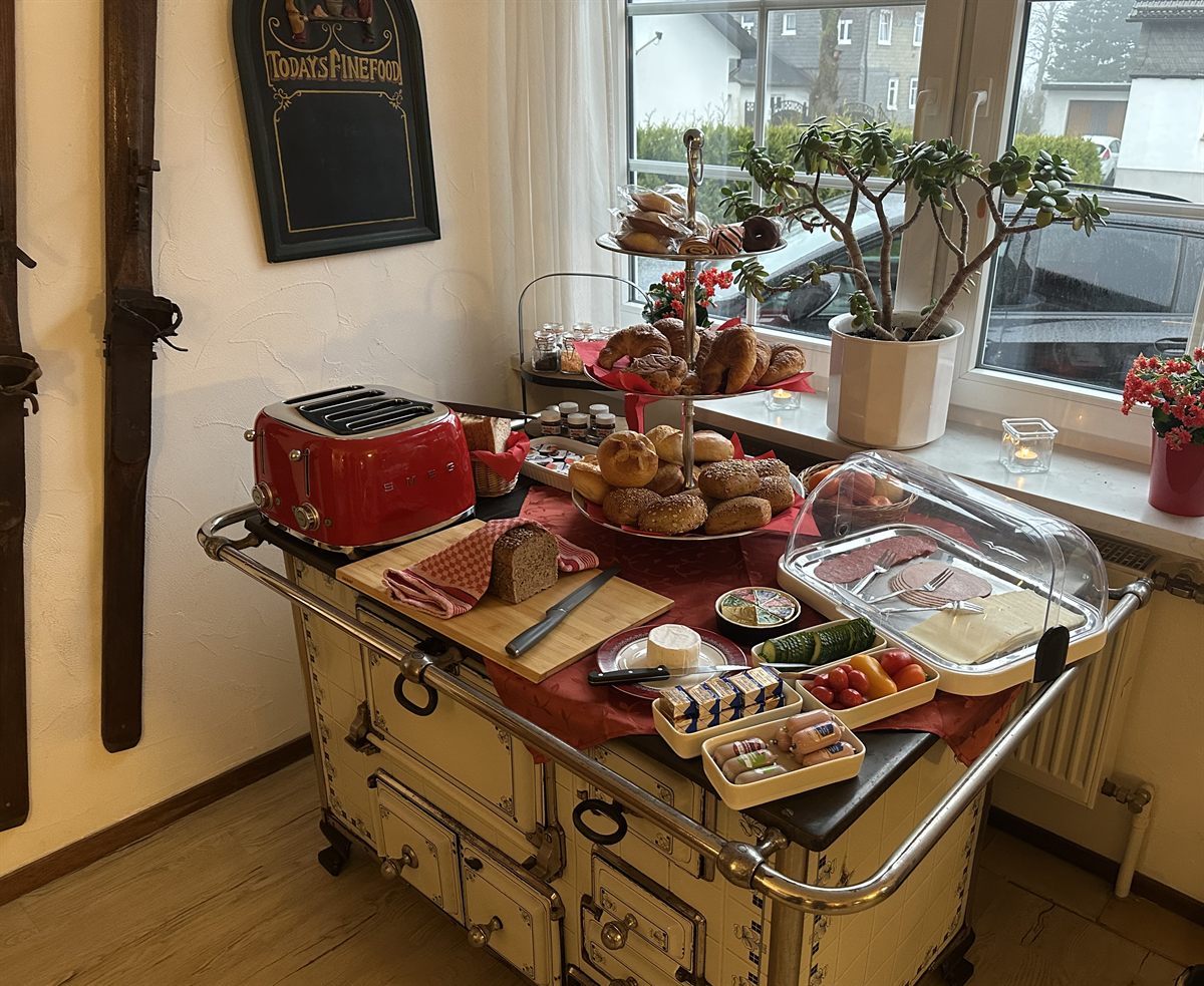 Breakfast buffet with fresh rolls and croissants at Haus Astenalm